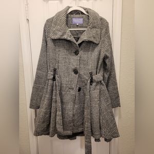 Black and white checked boxes coat with leather belt holding NWTs beautiful item